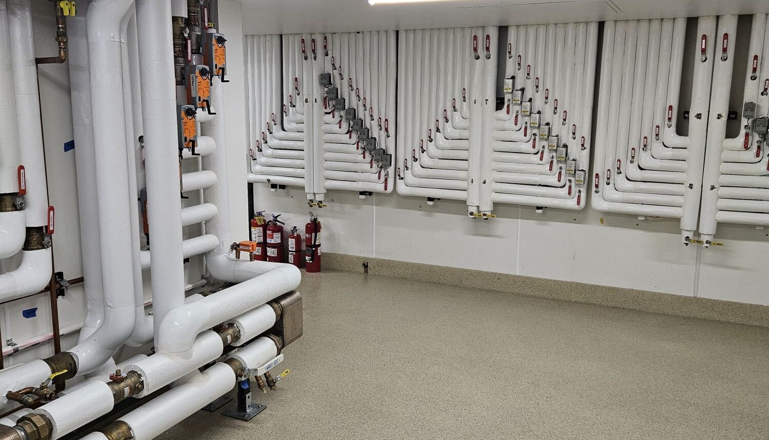 Snow melt manifold with heat exchangers